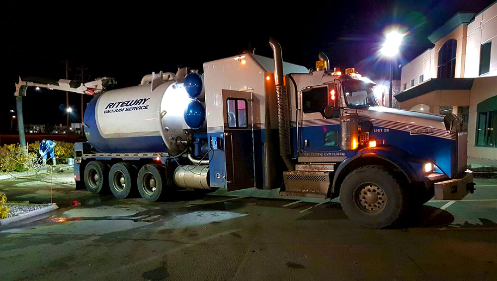 photo of a hydrovac truck working at a commercial business in Edmonton